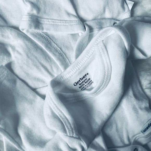 Gerber newborn onesies and a newborn carters sleeper - Picture 3 of 3